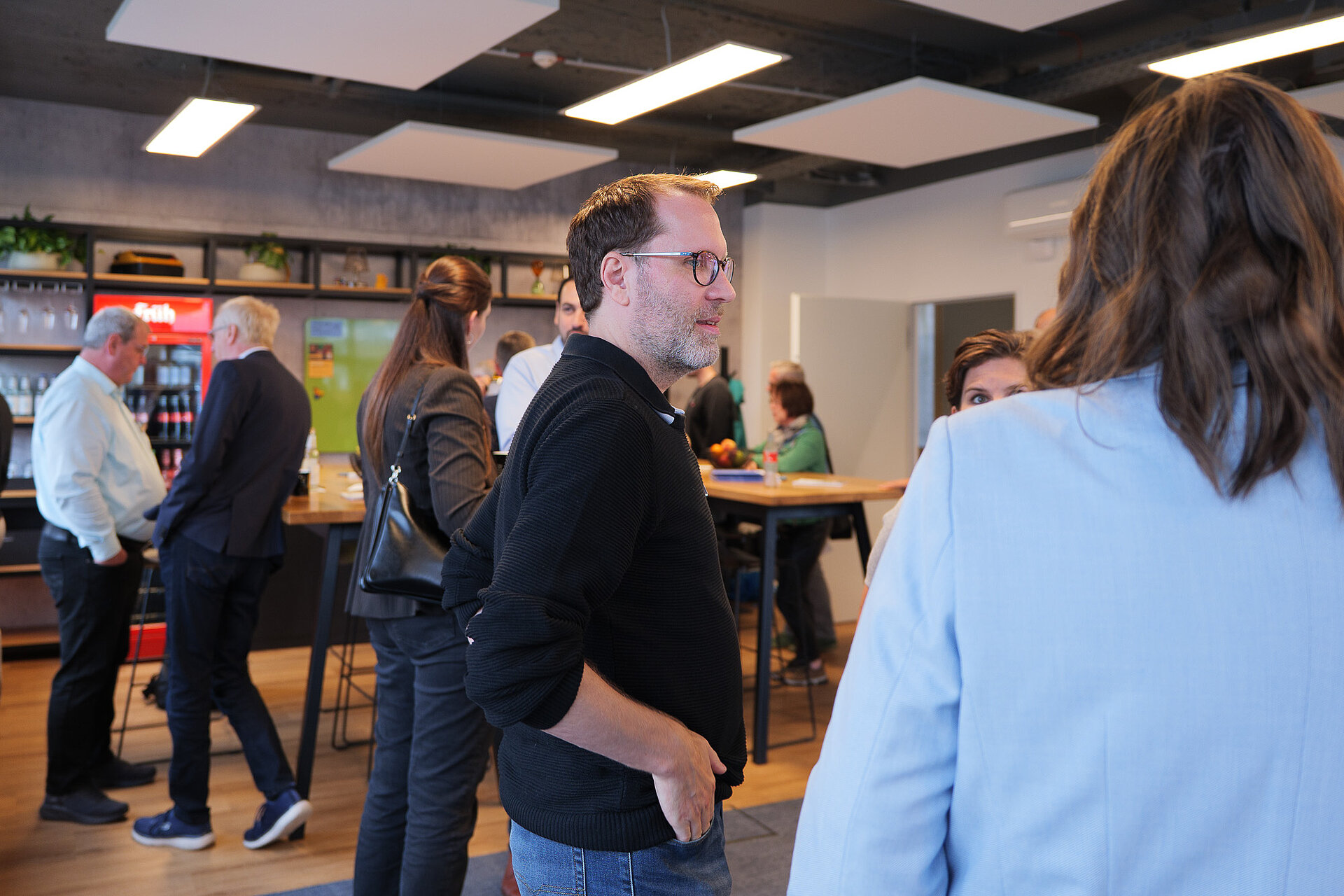 Teilnehmende und audatis-Team beim Networking